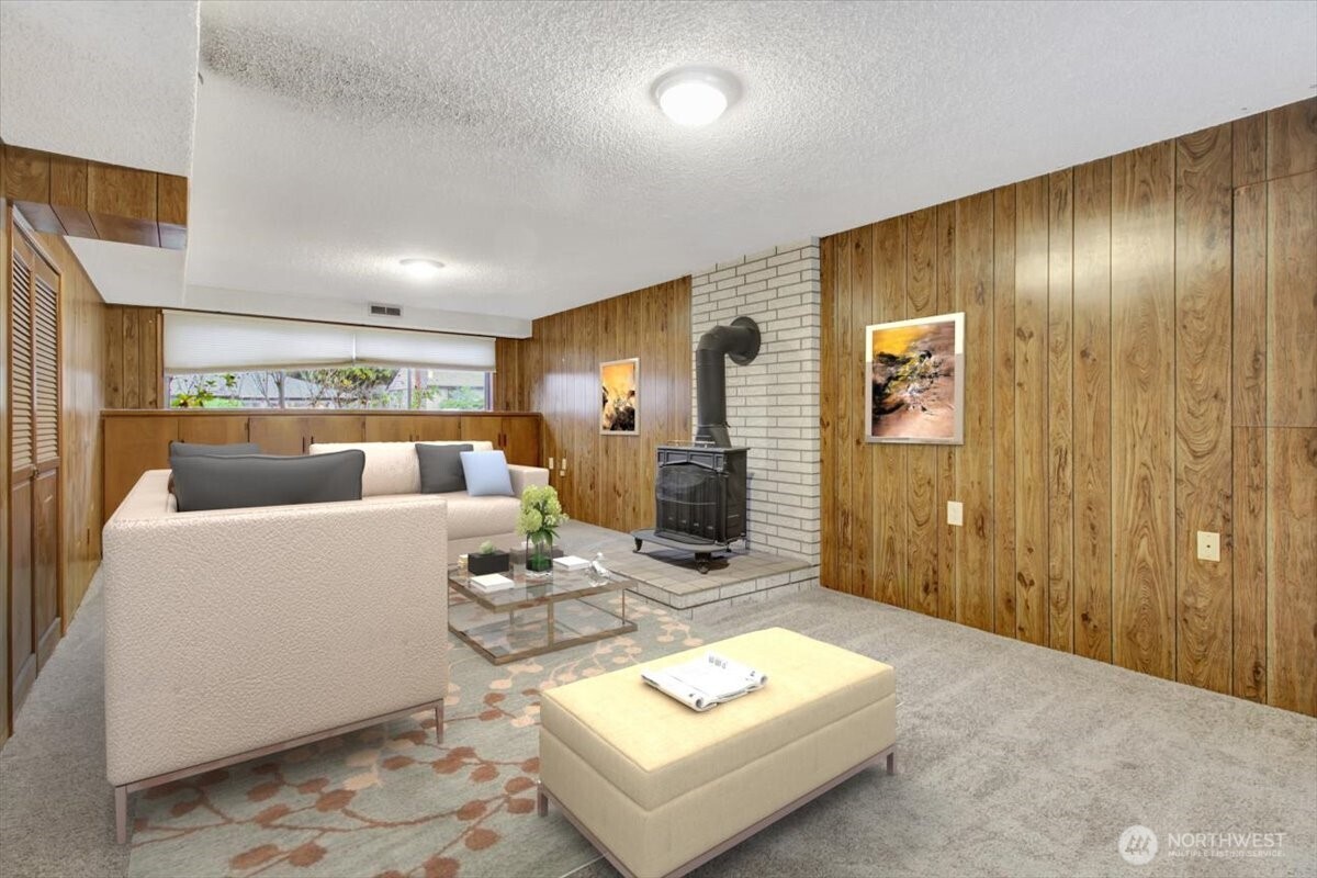 7313 228th Street Southwest Mountlake Terrace, WA 98043 - Photo 26 of 34 a living room with furniture and a window
