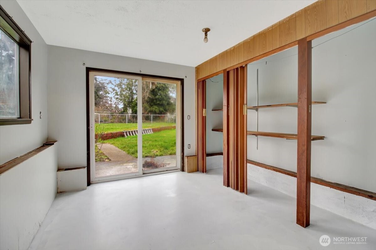 7313 228th Street Southwest Mountlake Terrace, WA 98043 - Photo 27 of 34 a view of an empty room and window