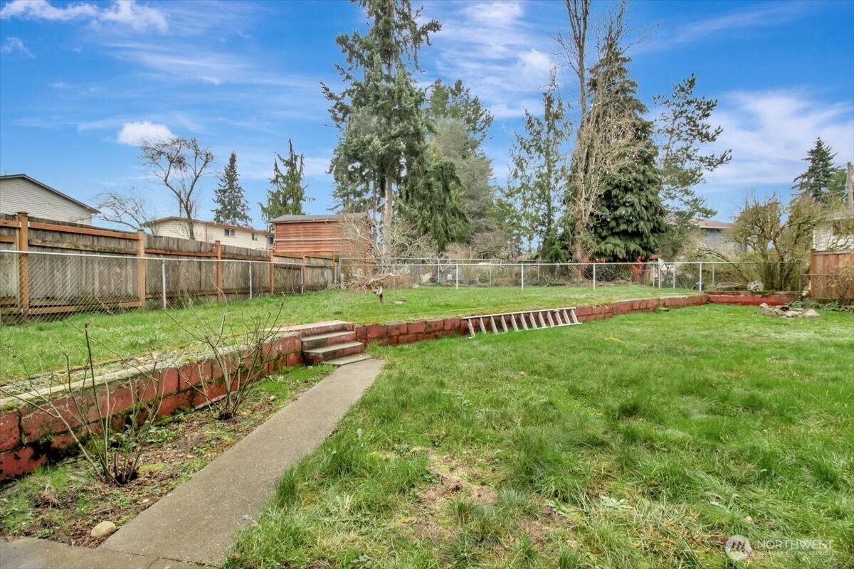 7313 228th Street Southwest Mountlake Terrace, WA 98043 - Photo 32 of 34 a view of a park with large trees