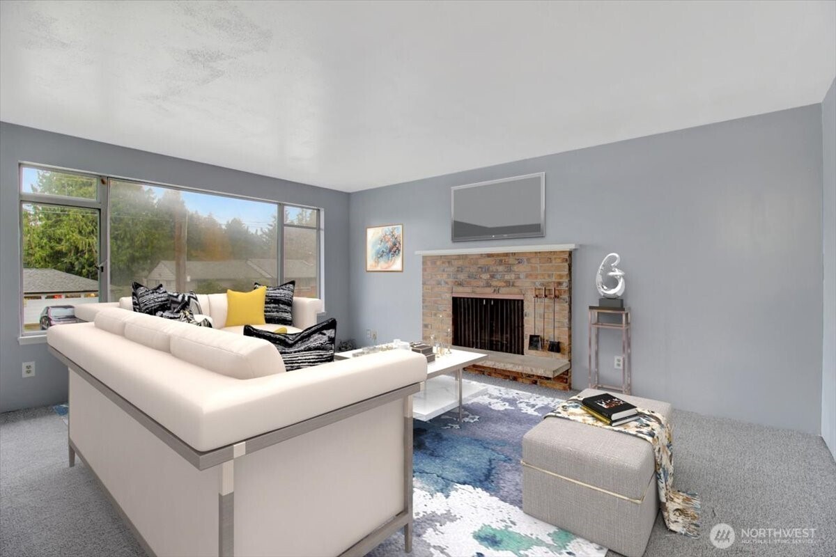 7313 228th Street Southwest Mountlake Terrace, WA 98043 - Photo 5 of 34 a living room with furniture a fireplace and a floor to ceiling window