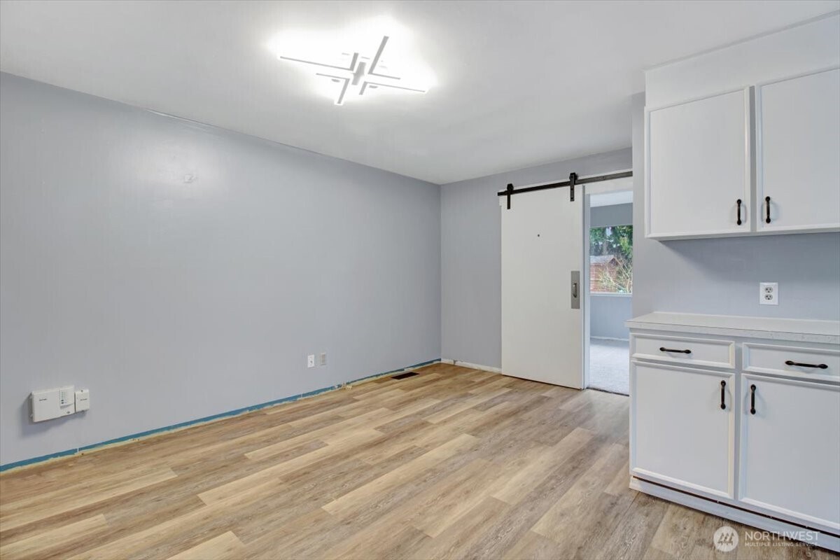 7313 228th Street Southwest Mountlake Terrace, WA 98043 - Photo 6 of 34 a view of a kitchen with electric appliances