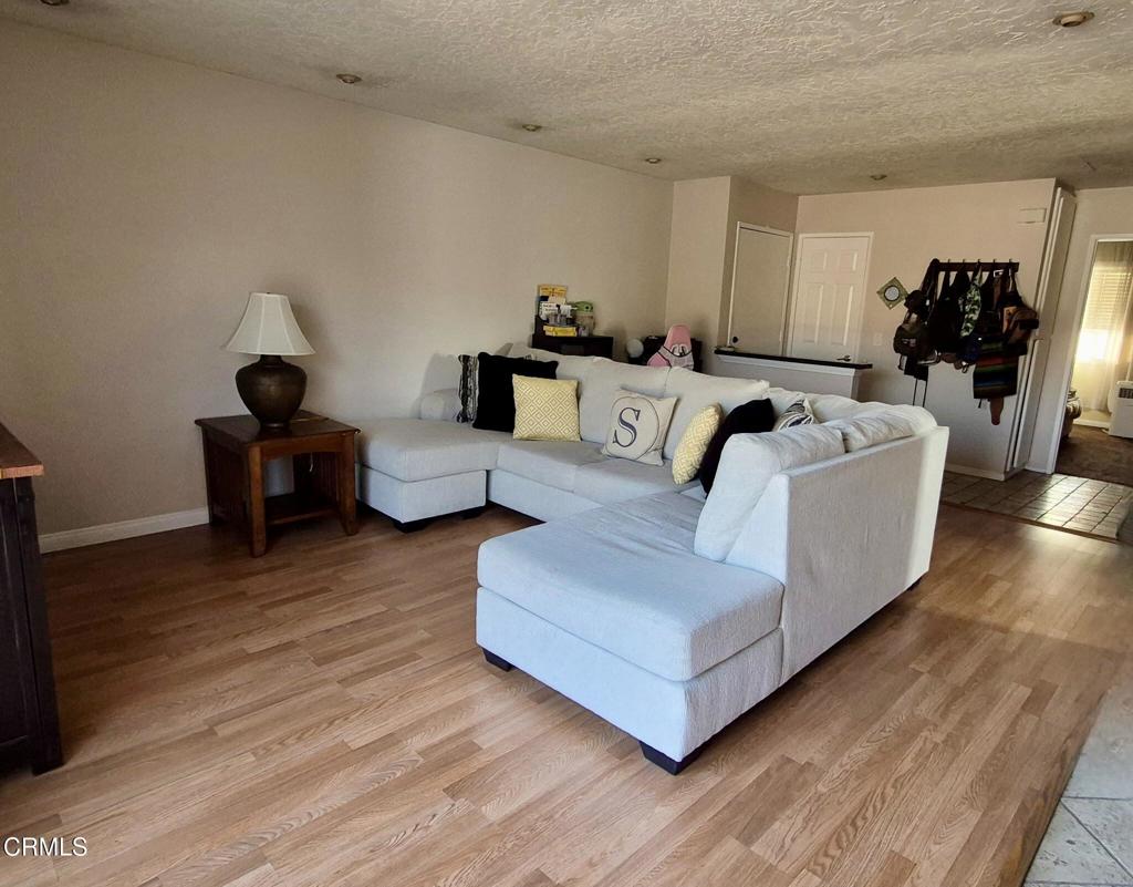 312 West Santa Barbara Street Santa Paula, CA 93060 - Photo 3 of 22 a living room with furniture and wooden floor