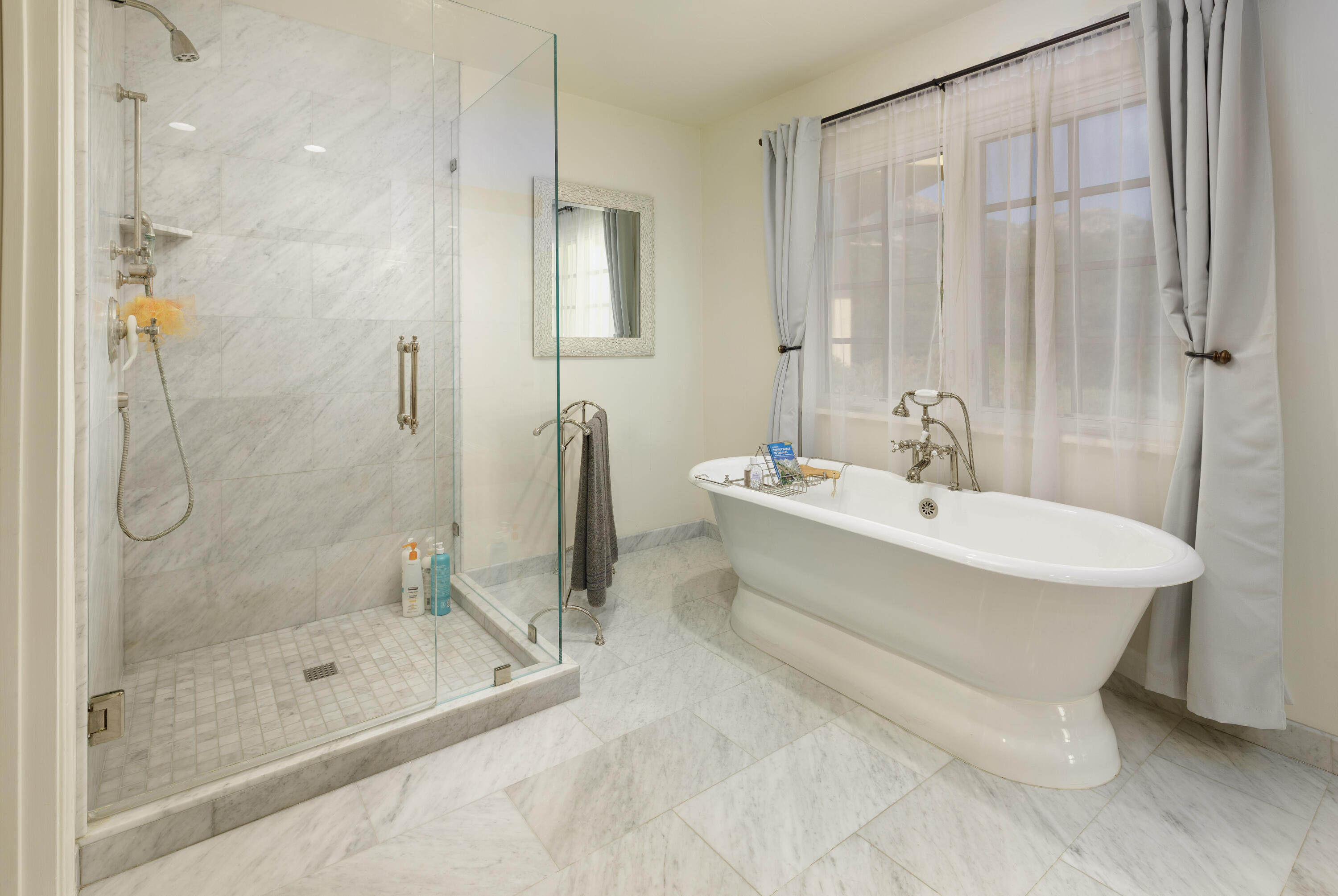 1230 Northridge Road Santa Barbara, CA 93105 - Photo 17 of 36 a bathroom with a bathtub and shower