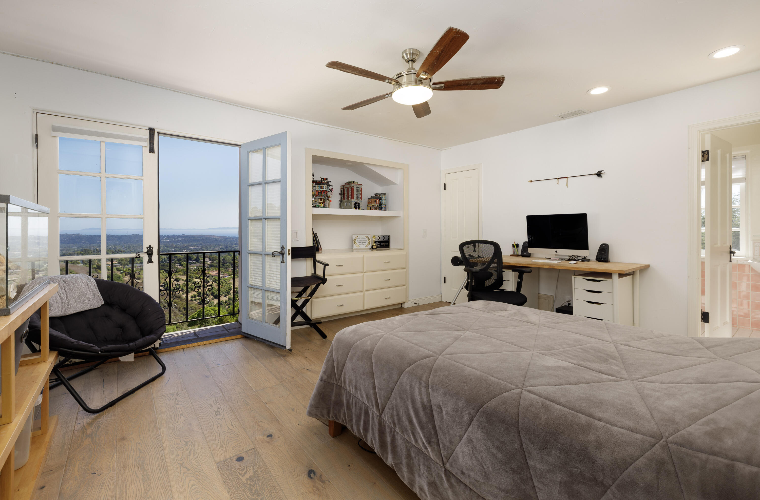 1230 Northridge Road Santa Barbara, CA 93105 - Photo 22 of 36 a bedroom with a bed a couch and a window