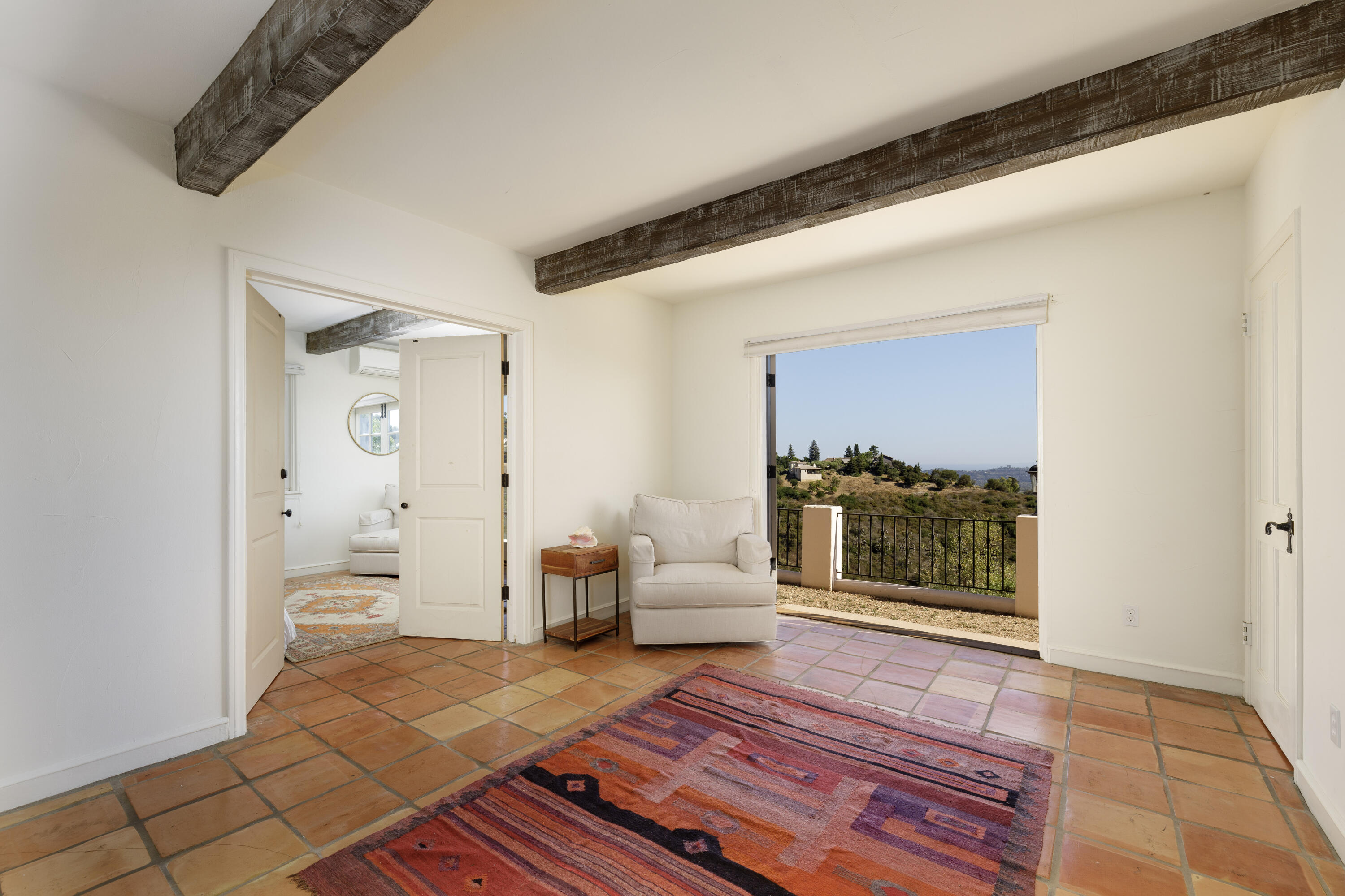 1230 Northridge Road Santa Barbara, CA 93105 - Photo 25 of 36 a bedroom with furniture and a rug