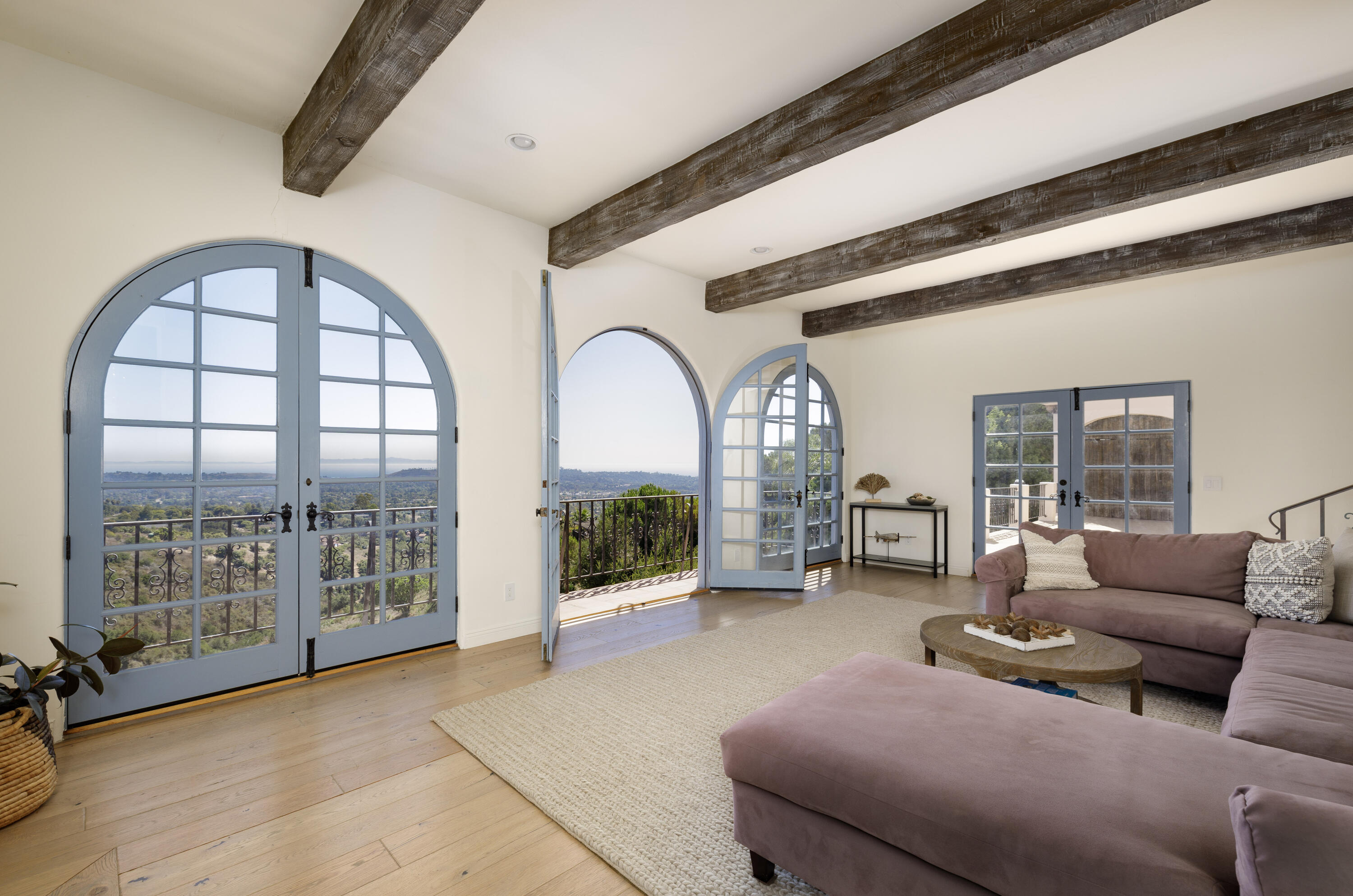 1230 Northridge Road Santa Barbara, CA 93105 - Photo 9 of 36 a living room with furniture and a large window