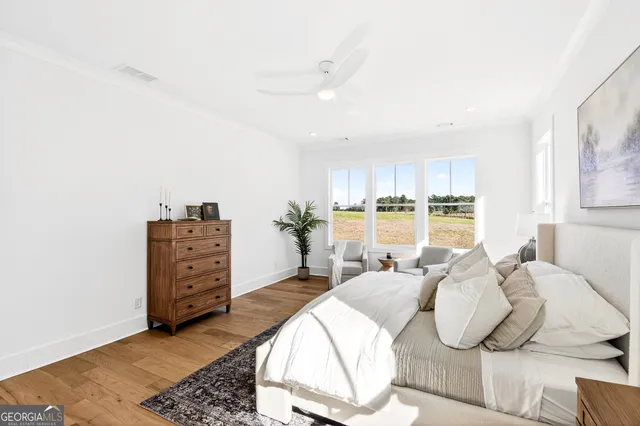 a bathroom with double vanity sinks and a mirror