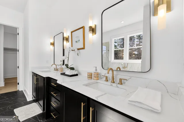 an empty room with a ceiling fan and window