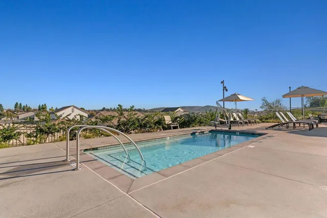 a view of a terrace with a lake view