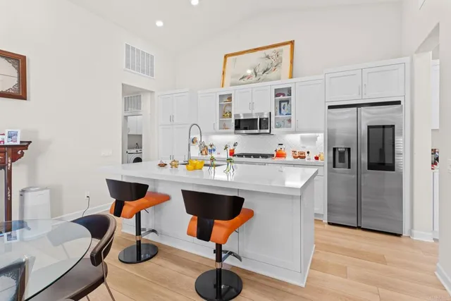 a work place with furniture and wooden floor