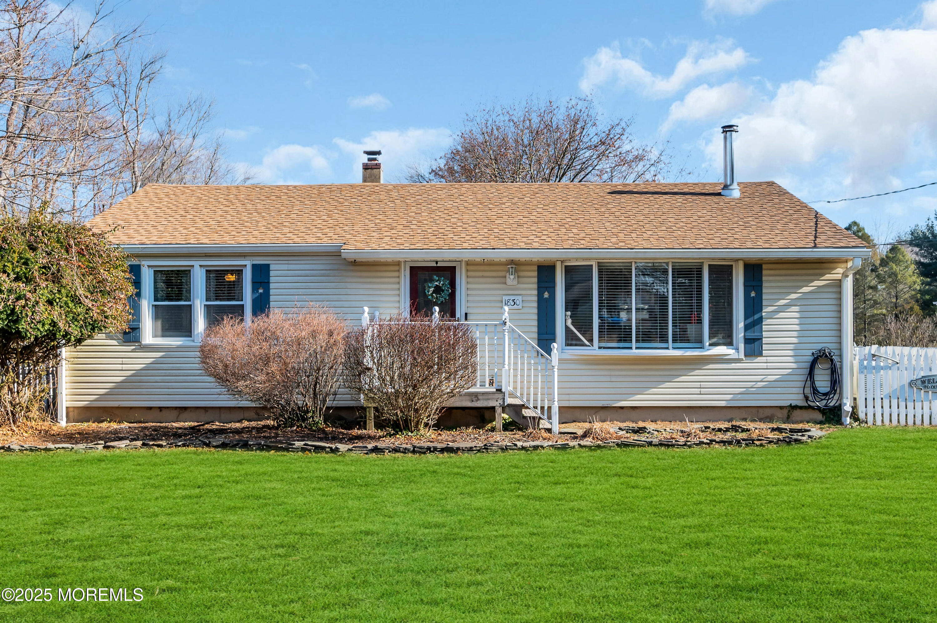 a house view with a garden space