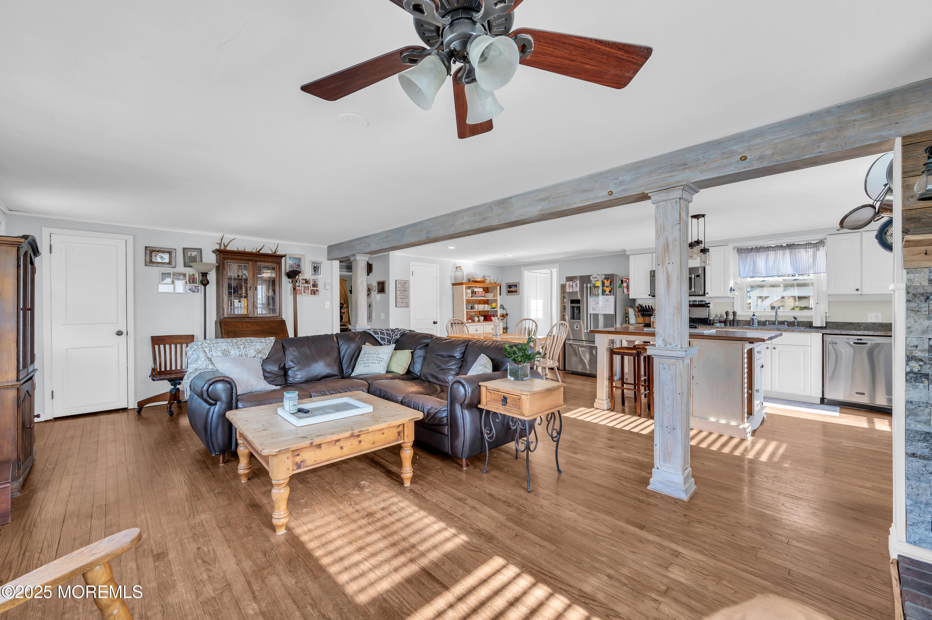 1830 New Bedford Road Wall, NJ 07719 - Photo 13 of 65 a living room with furniture and a wooden floor