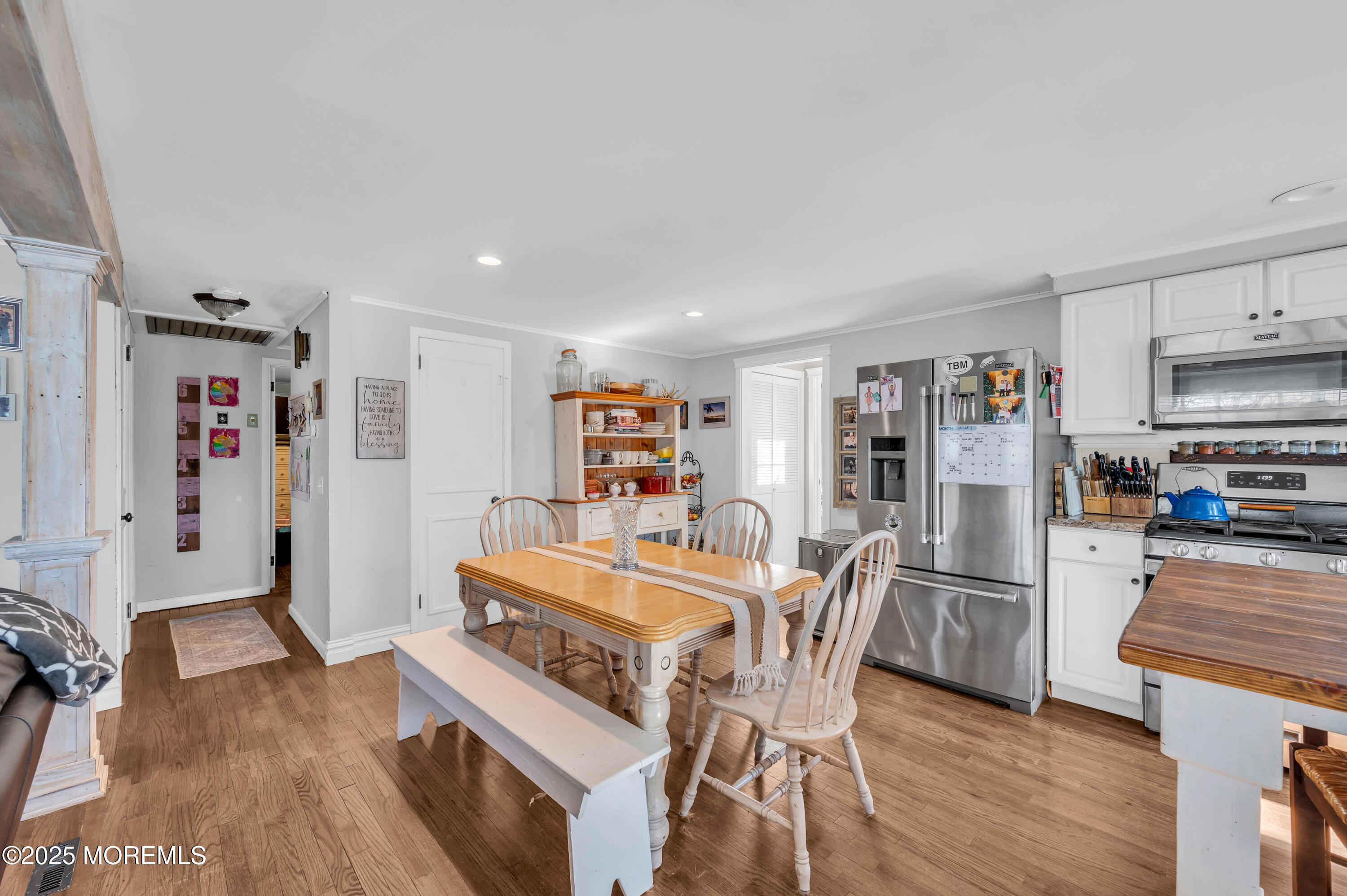 1830 New Bedford Road Wall, NJ 07719 - Photo 22 of 65 a view of a dining room with furniture a rug and wooden floor