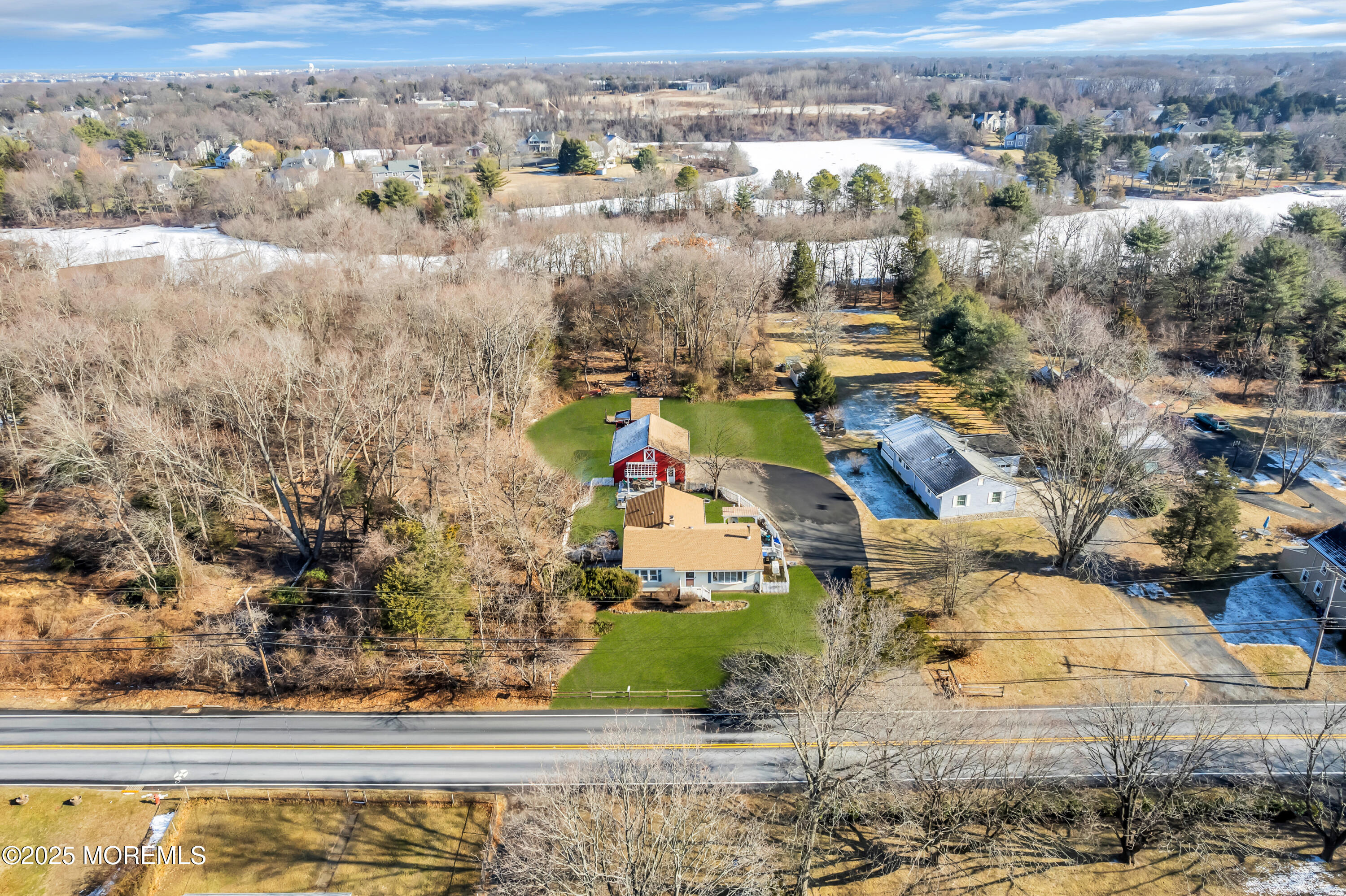 1830 New Bedford Road Wall, NJ 07719 - Photo 3 of 65 an aerial view of a houses with a lake view