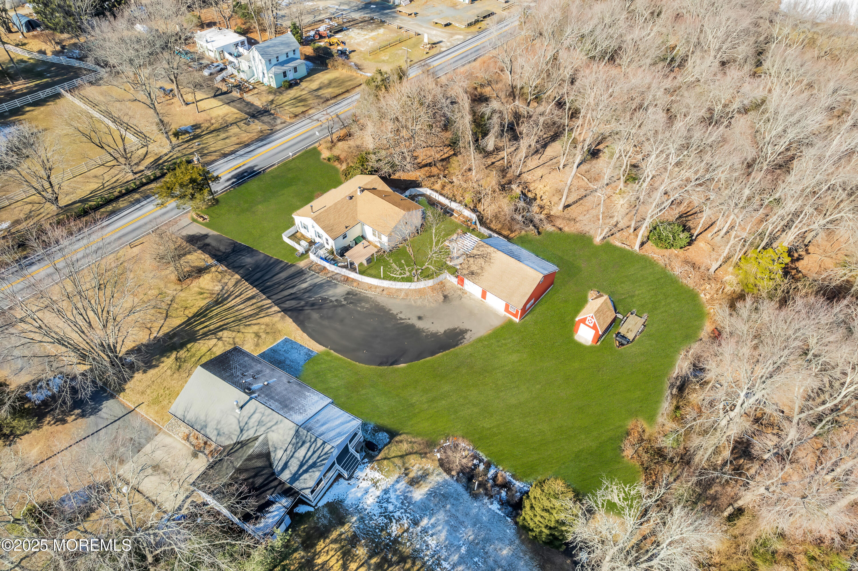 1830 New Bedford Road Wall, NJ 07719 - Photo 4 of 65 an aerial view of a house with a yard