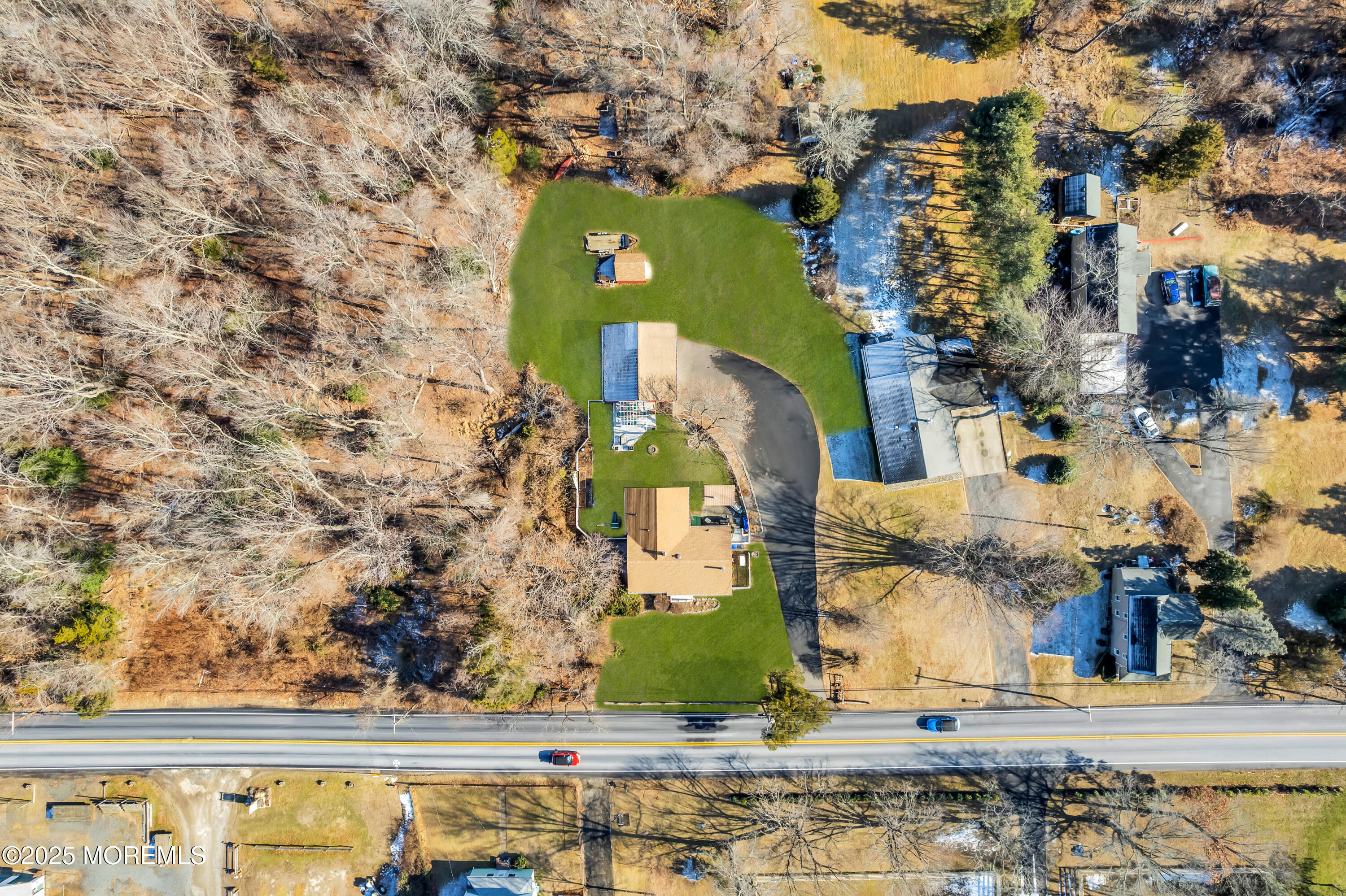 1830 New Bedford Road Wall, NJ 07719 - Photo 61 of 65 an aerial view of a house with a swimming pool