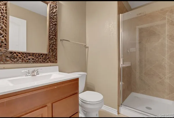 a view of a house with backyard and chairs