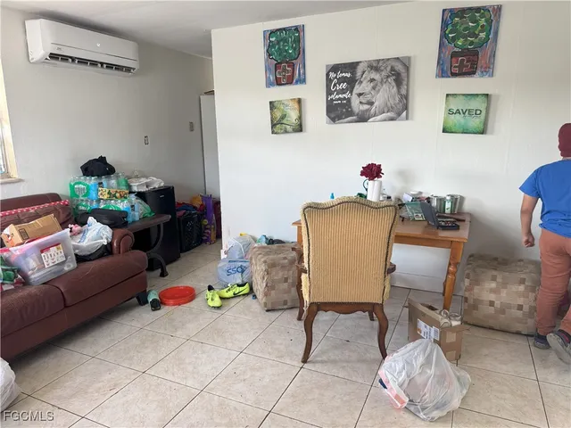 a dining room with furniture and a couch