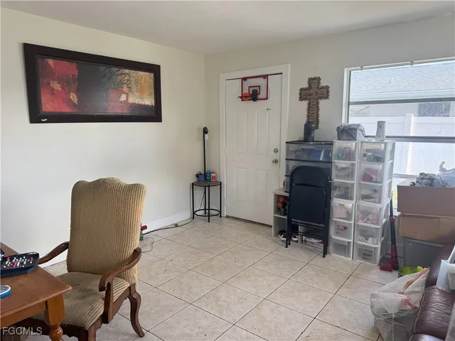 a workspace with furniture and a window