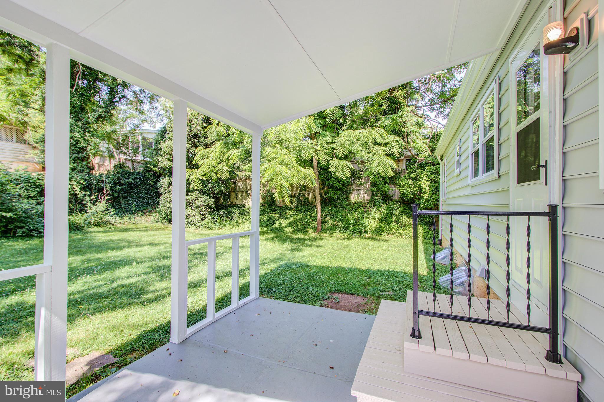 1011 Gilbert Road Rockville, MD 20851 - Photo 13 of 35 Back Porch Overlooks A Private & Level Yard