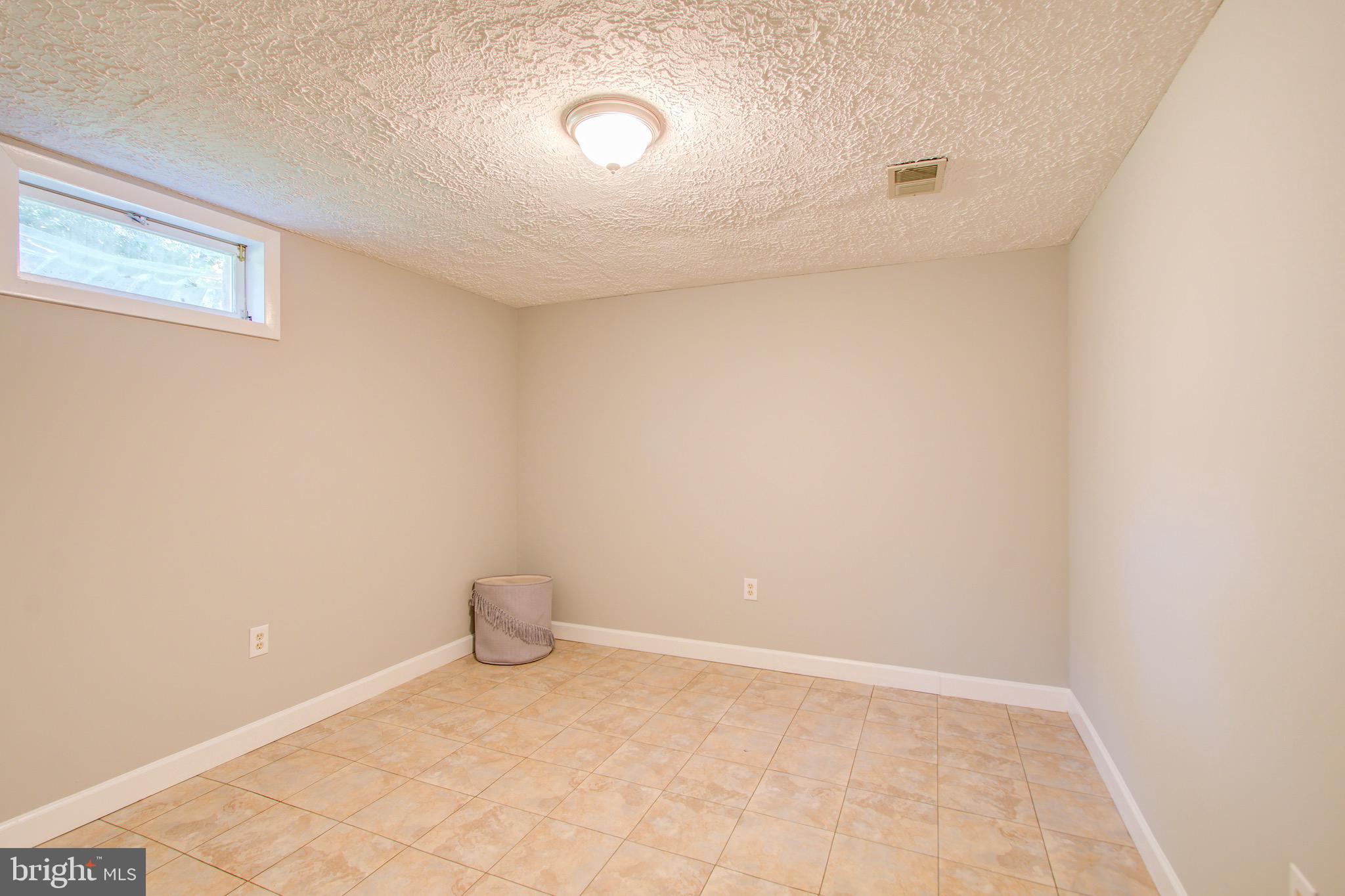 1011 Gilbert Road Rockville, MD 20851 - Photo 27 of 35 A Quiet, Lower Level Room for Privacy