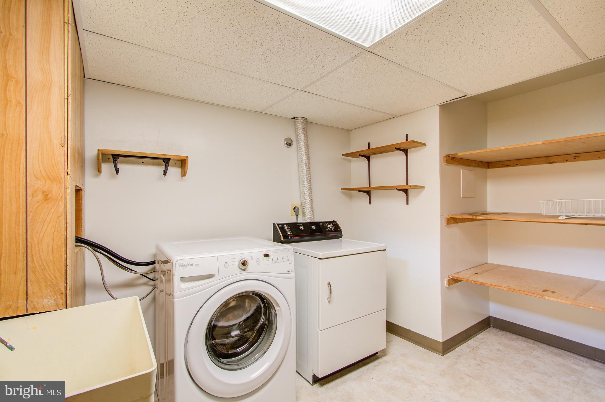 1011 Gilbert Road Rockville, MD 20851 - Photo 30 of 35 Bright & Sparkling Clean Laundry w/Shelving
