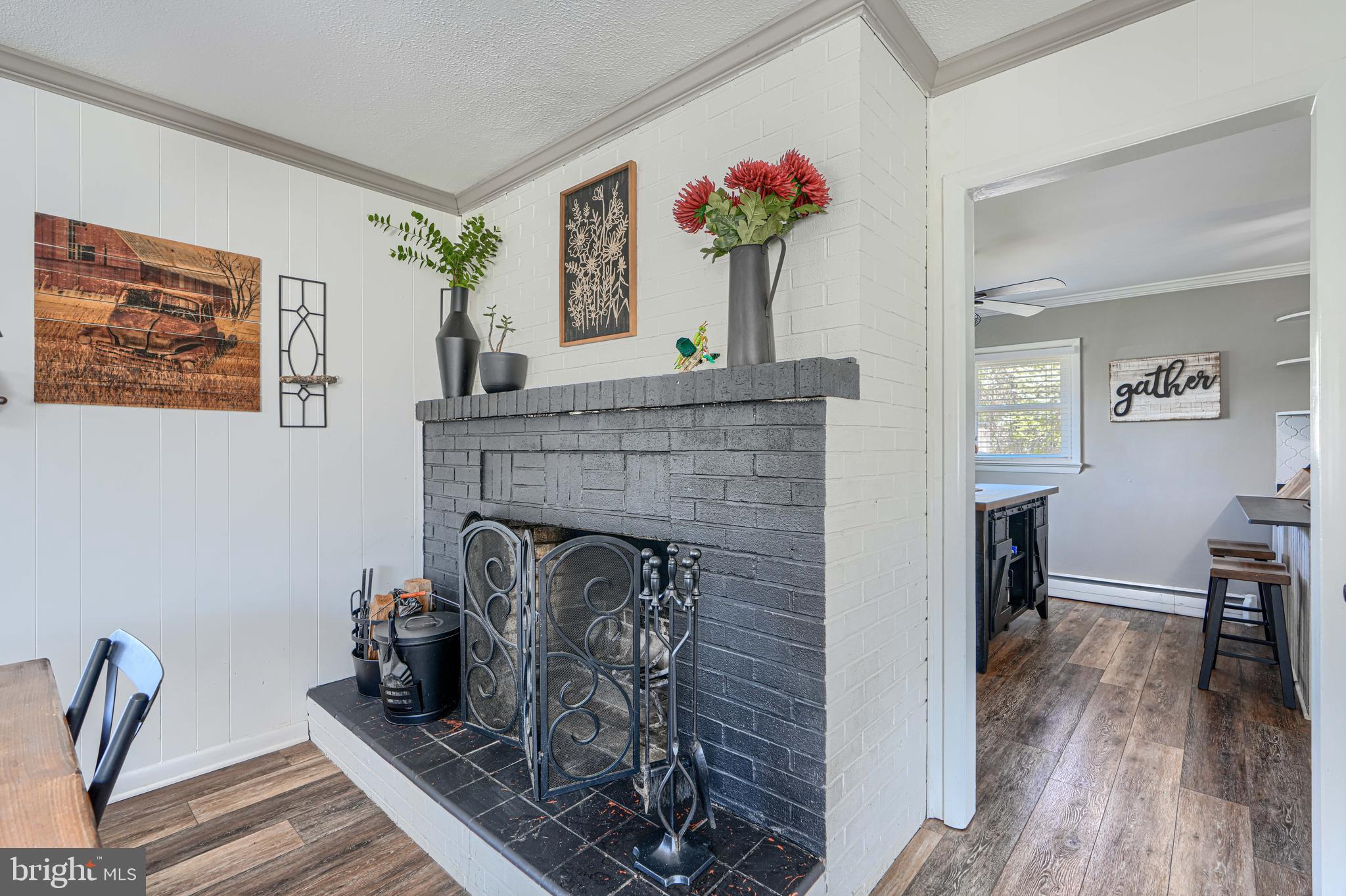 1314 East Churchville Road Bel Air, MD 21014 - Photo 11 of 48 a living room with furniture and a fireplace