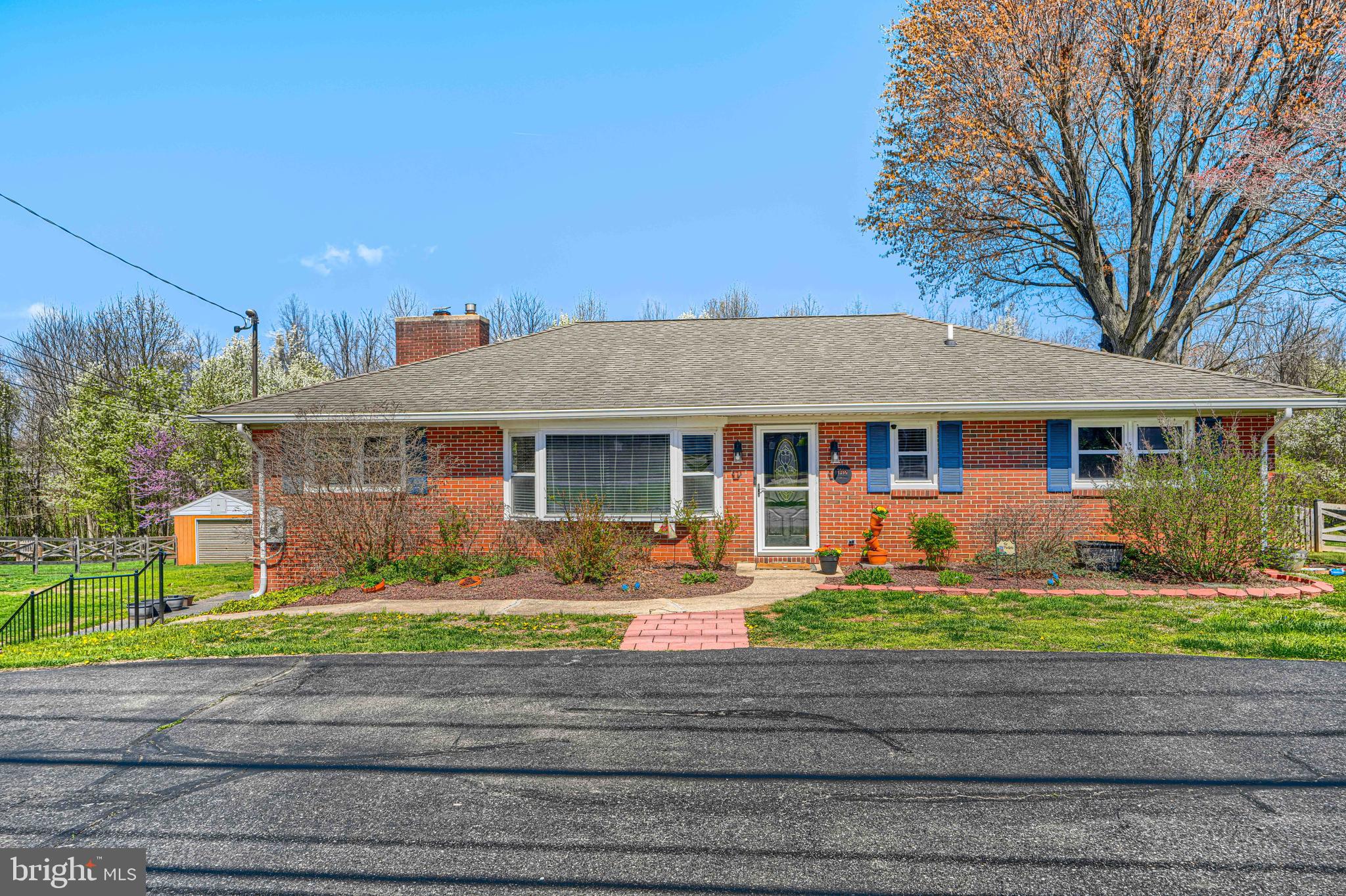 1314 East Churchville Road Bel Air, MD 21014 - Photo 2 of 48 a front view of a house with garden