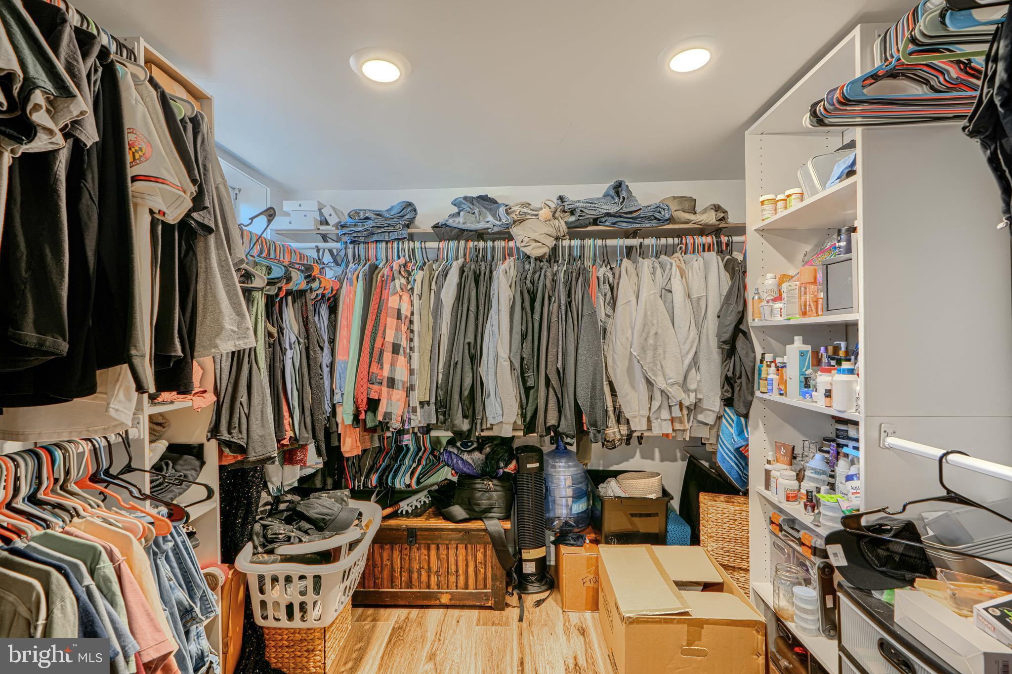 1314 East Churchville Road Bel Air, MD 21014 - Photo 24 of 48 a view of walk in closet with clothes and shoes