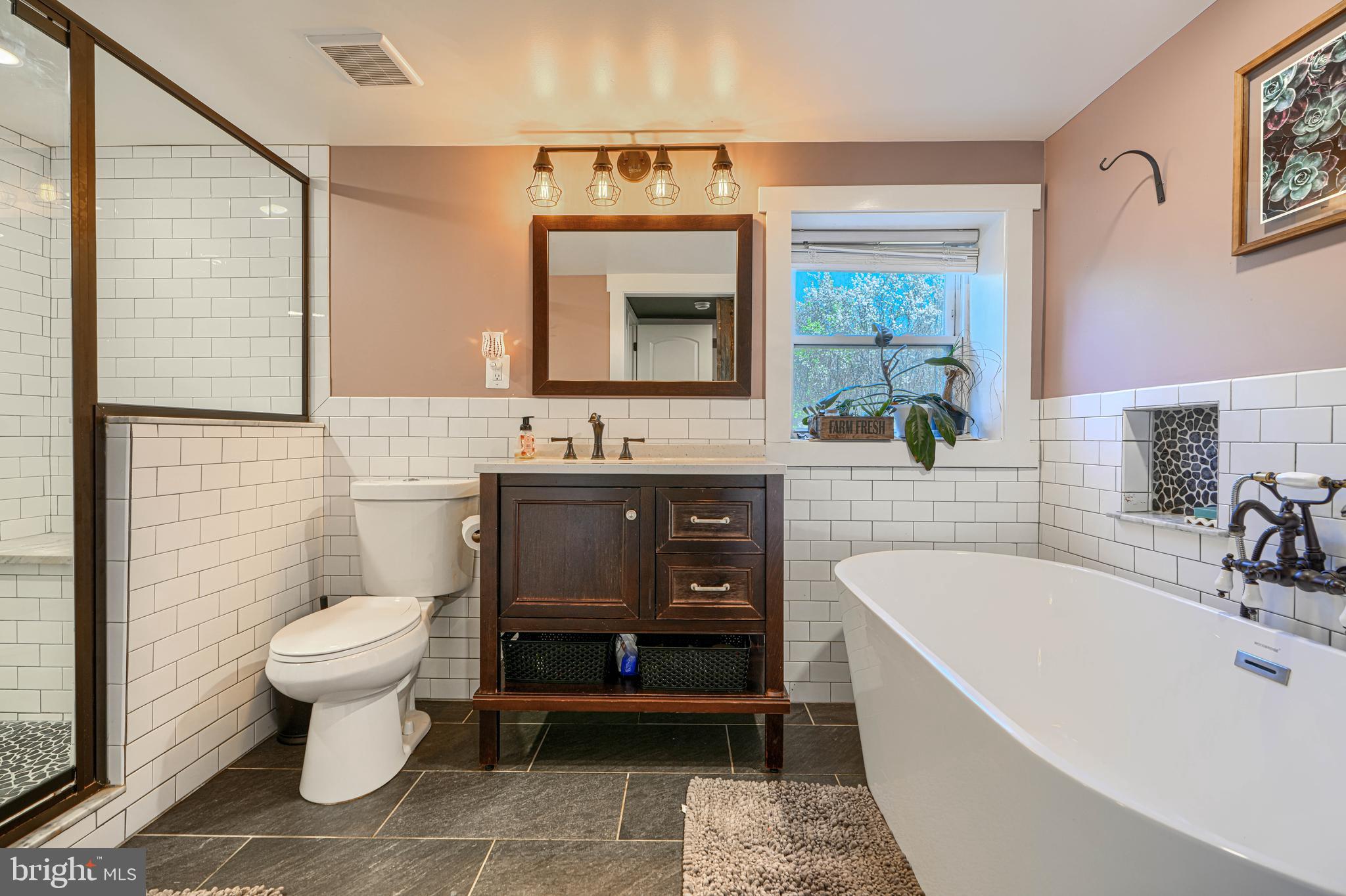1314 East Churchville Road Bel Air, MD 21014 - Photo 25 of 48 a bathroom with a sink a toilet and mirror