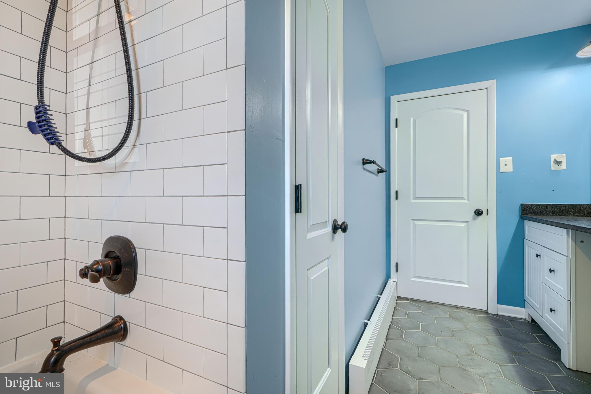 1314 East Churchville Road Bel Air, MD 21014 - Photo 33 of 48 a bathroom with a mirror and a shower