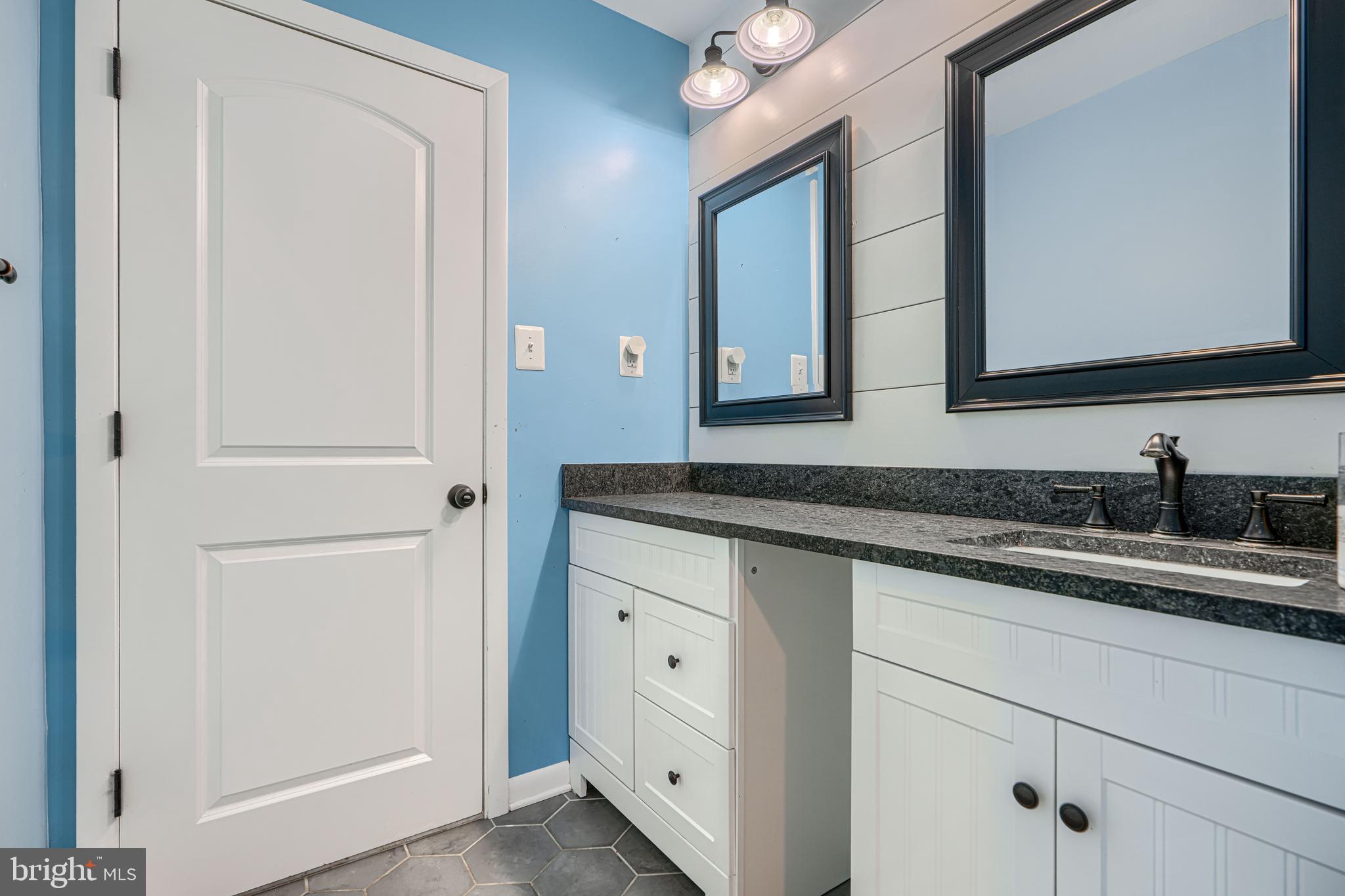 1314 East Churchville Road Bel Air, MD 21014 - Photo 34 of 48 a bathroom with a sink and a mirror