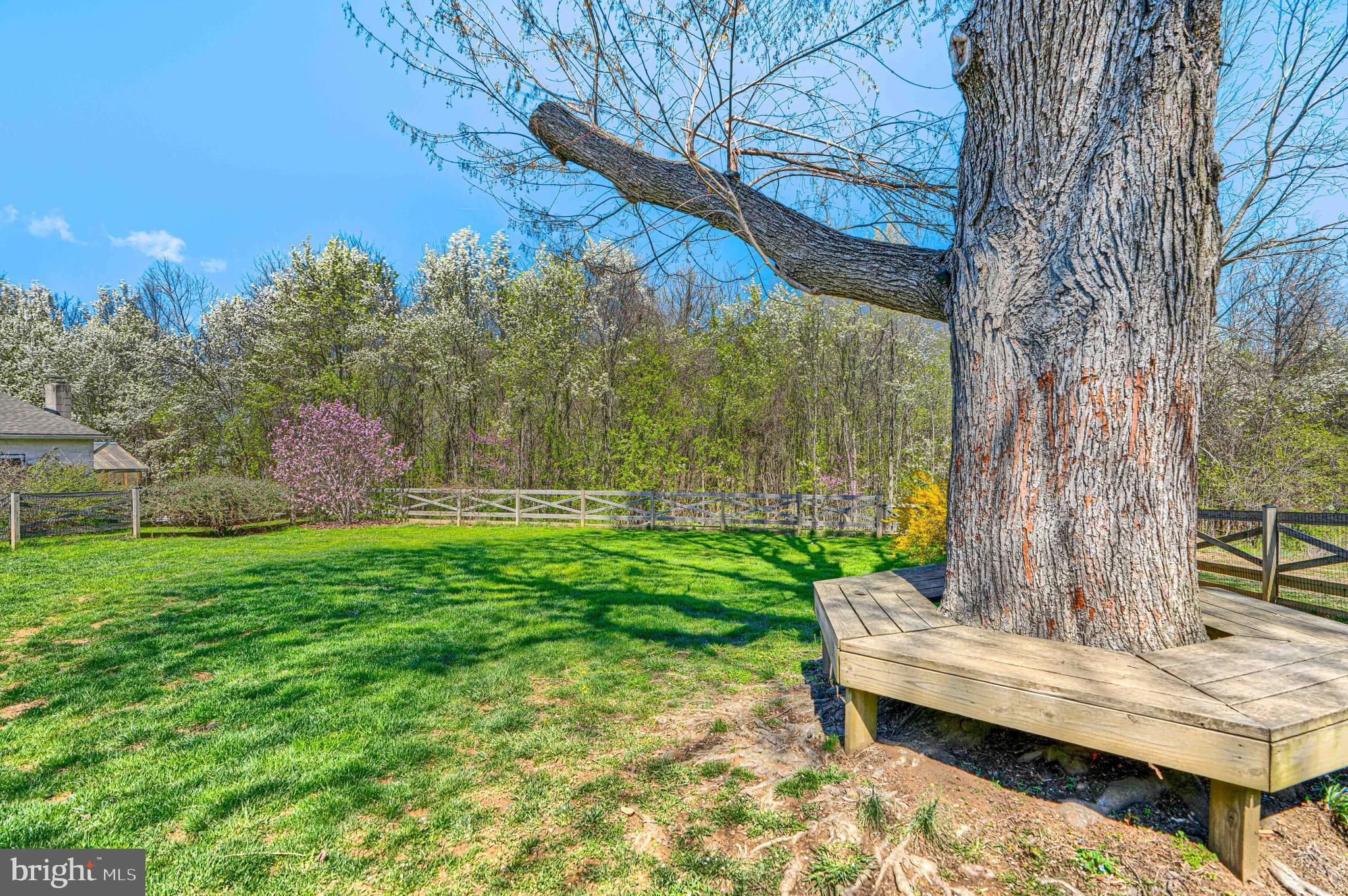 1314 East Churchville Road Bel Air, MD 21014 - Photo 44 of 48 a view of a bench in a garden
