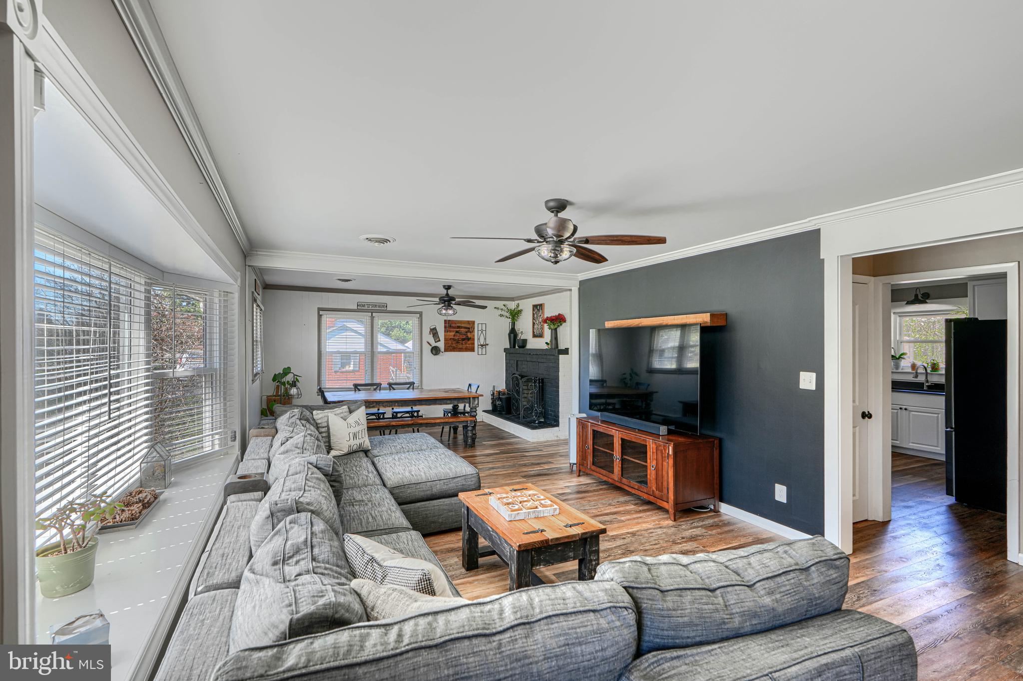 1314 East Churchville Road Bel Air, MD 21014 - Photo 6 of 48 a living room with furniture and a flat screen tv