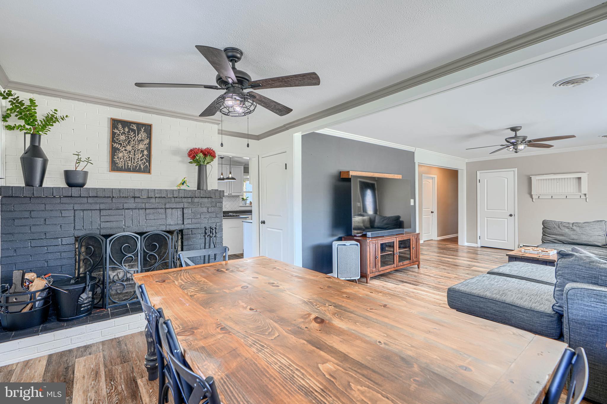 1314 East Churchville Road Bel Air, MD 21014 - Photo 10 of 48 a view of a livingroom with furniture a flat screen tv and couches