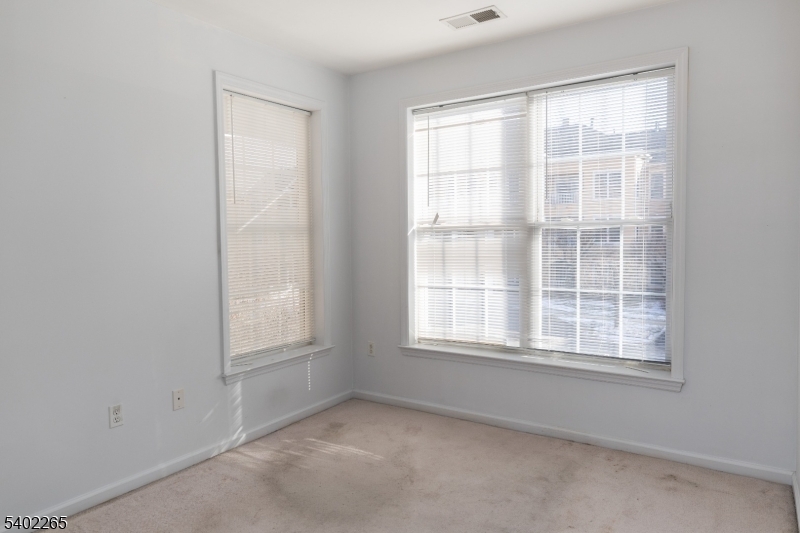 2201 Franklin Lane, Unit 2201 Rockaway, NJ 07866 - Photo 9 of 31 an empty room with a window