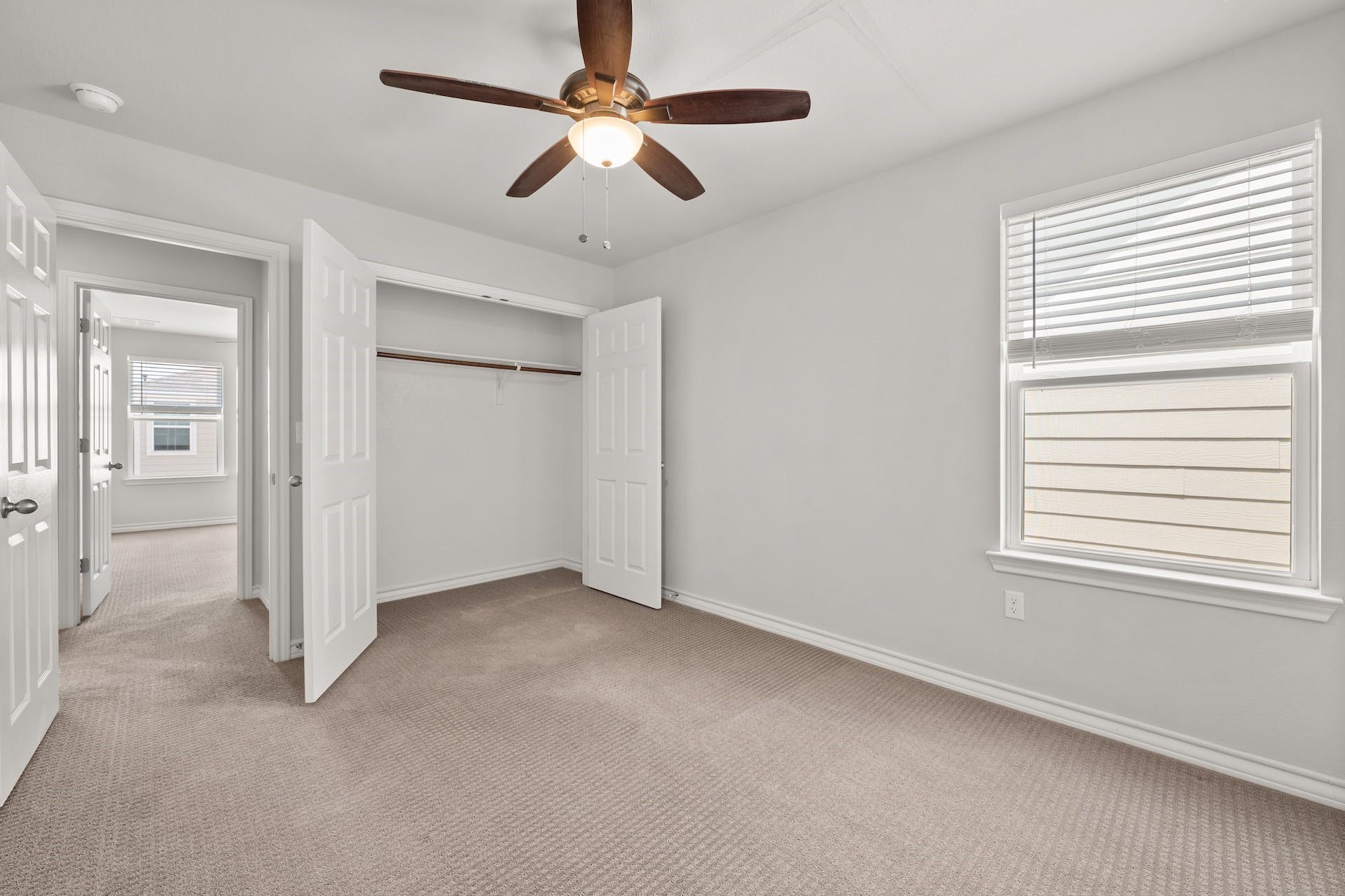 5107 Lemon Tree Path, Unit 127 Austin, TX 78723 - Photo 28 of 40 wooden floor in an empty room with a window