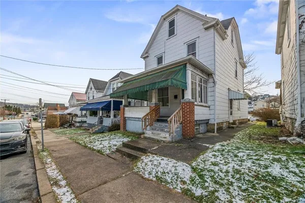 a view of a house with a patio