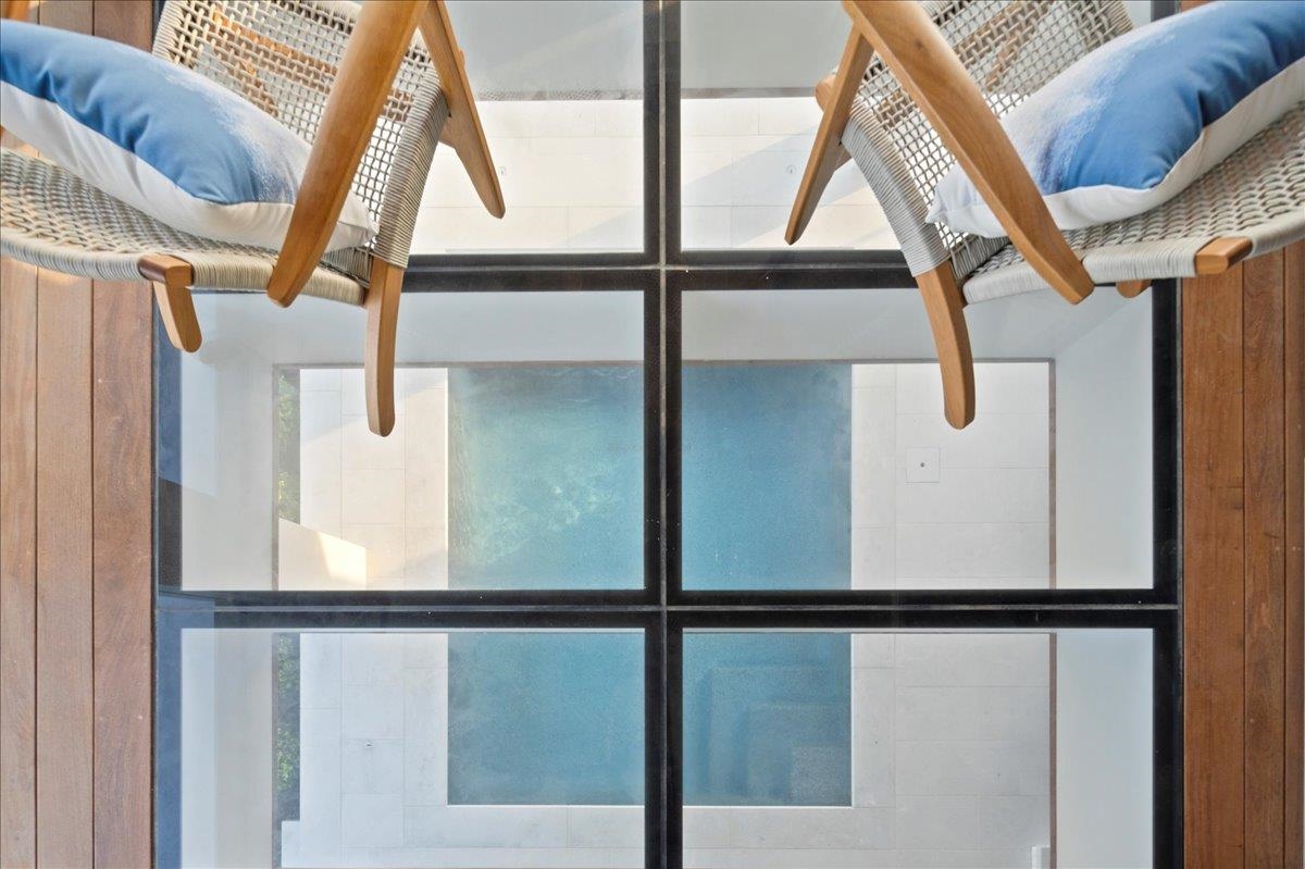 83 25th Street East Avalon, NJ 08202 - Photo 13 of 47 a view of with a large window with a hallway