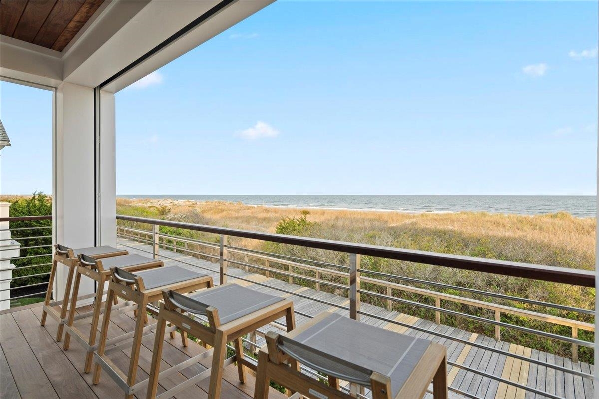 83 25th Street East Avalon, NJ 08202 - Photo 14 of 47 a view of a balcony with an ocean view