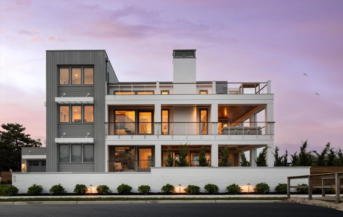 83 25th Street East Avalon, NJ 08202 - Photo 2 of 47 a front view of a building with street view