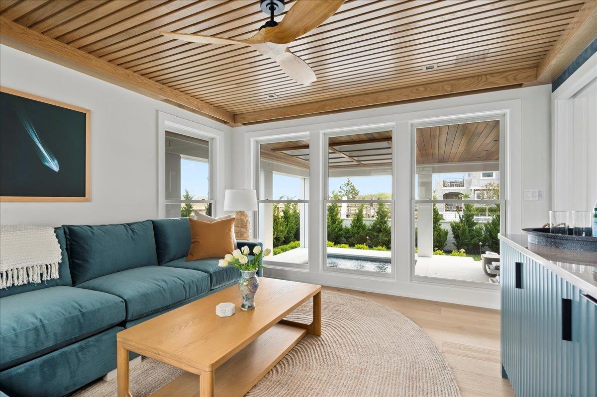 83 25th Street East Avalon, NJ 08202 - Photo 24 of 47 a living room with furniture and a large window