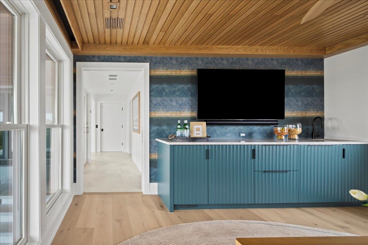 83 25th Street East Avalon, NJ 08202 - Photo 25 of 47 a room with furniture and flat screen tv