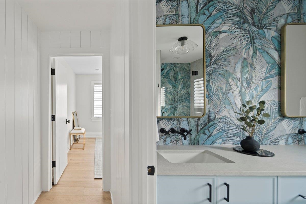83 25th Street East Avalon, NJ 08202 - Photo 29 of 47 a bathroom with a sink and mirror with bathtub