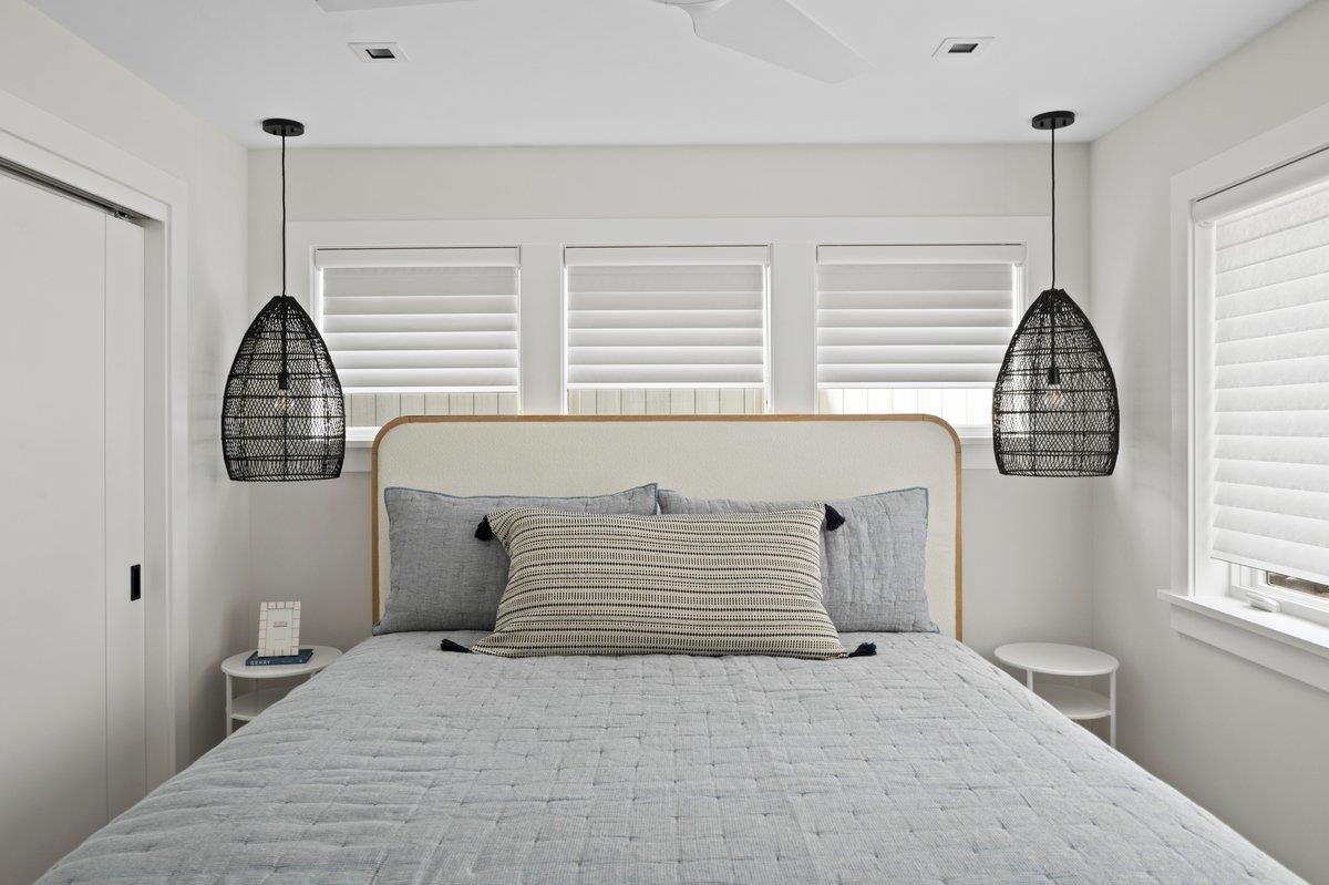 83 25th Street East Avalon, NJ 08202 - Photo 32 of 47 a bedroom with a large bed and a window