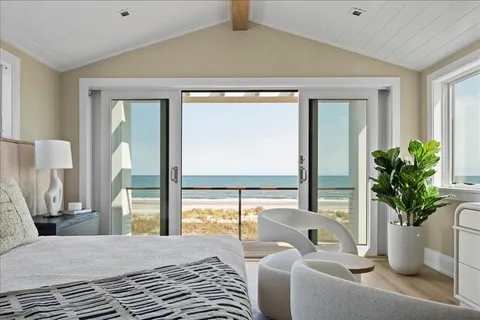 a bedroom with furniture and a window