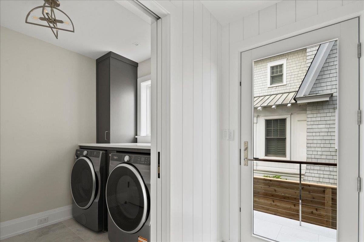 83 25th Street East Avalon, NJ 08202 - Photo 40 of 47 a view of a hallway with washer and dryer