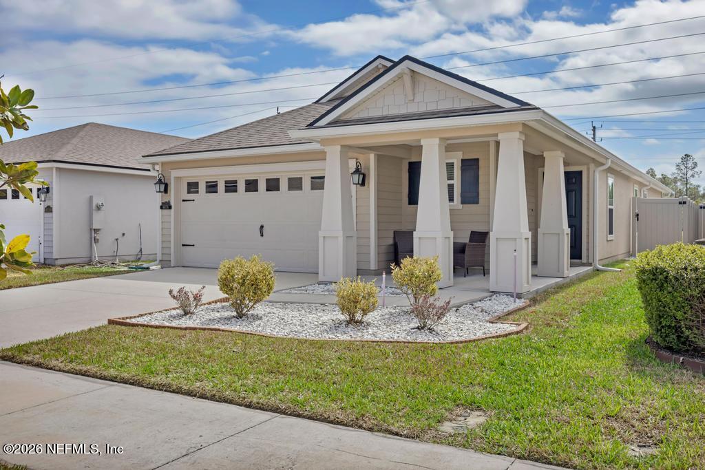 86178 Mainline Road Yulee, FL 32097 - Photo 4 of 61 a view of a house with backyard