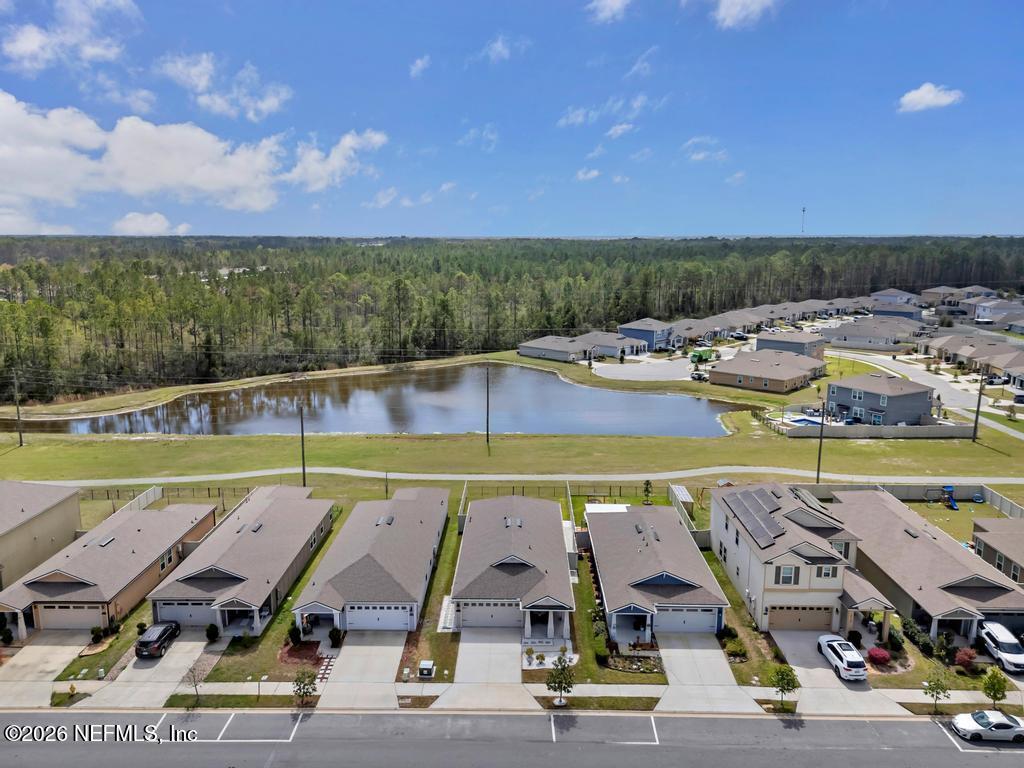 86178 Mainline Road Yulee, FL 32097 - Photo 44 of 61 a view of swimming pool with seating space and barbeque oven