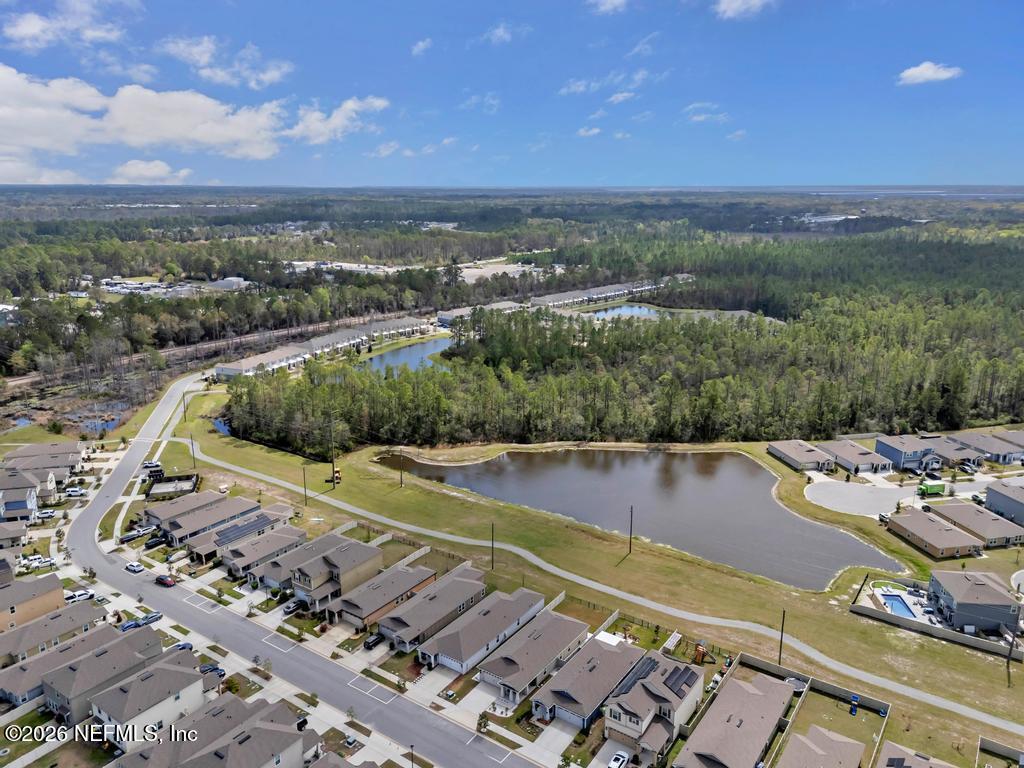 86178 Mainline Road Yulee, FL 32097 - Photo 47 of 61 an aerial view of a house with a lake view